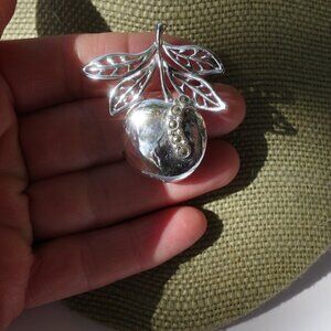 Women`s silver tone apple teacher brooch pin. 1 3/